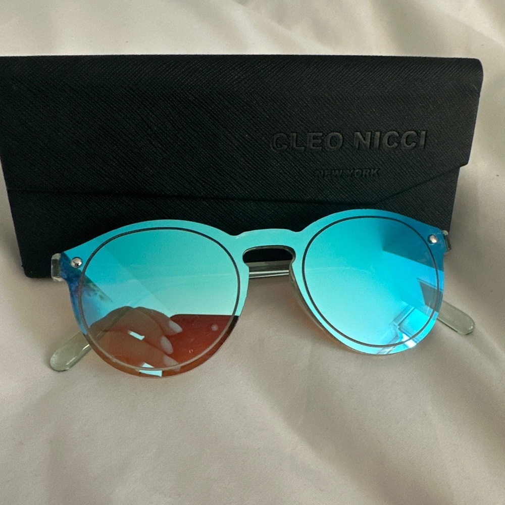 Green/blue tinted sunglasses by Cleo Nicci New York